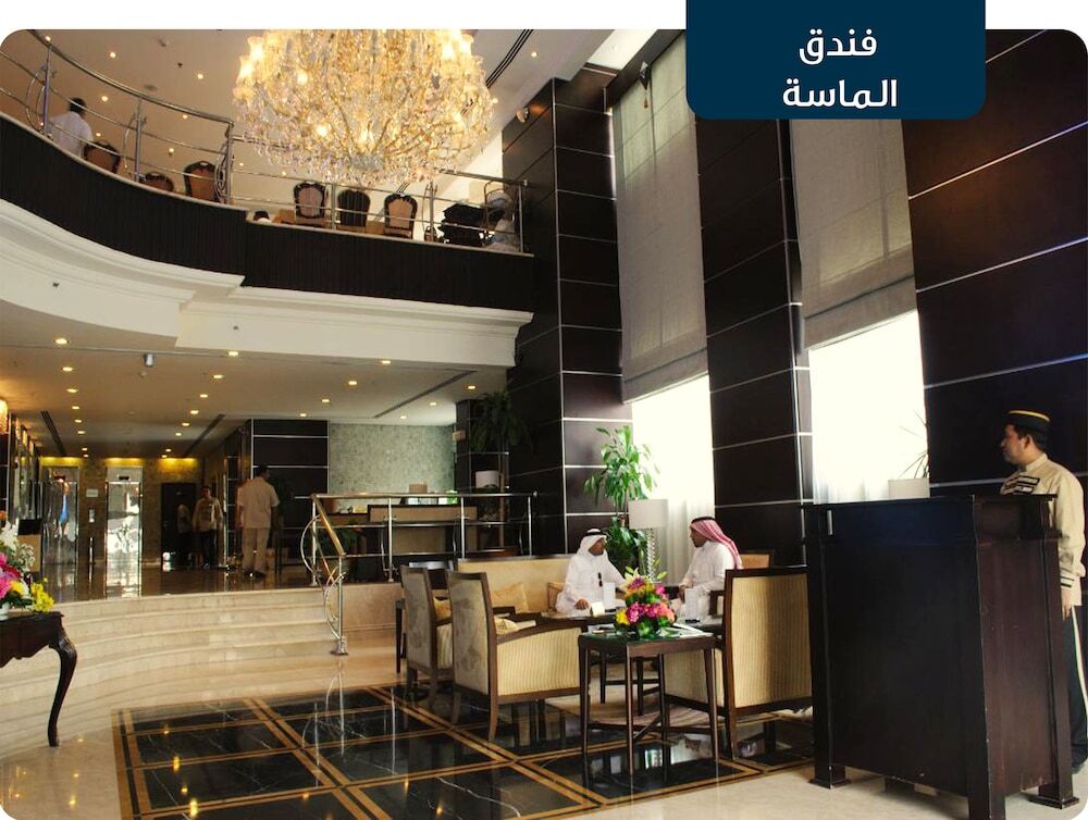 Al Massa Grand Hotel - Luxury room interior with Haram view, premium Umrah accommodation facilities and amenities
