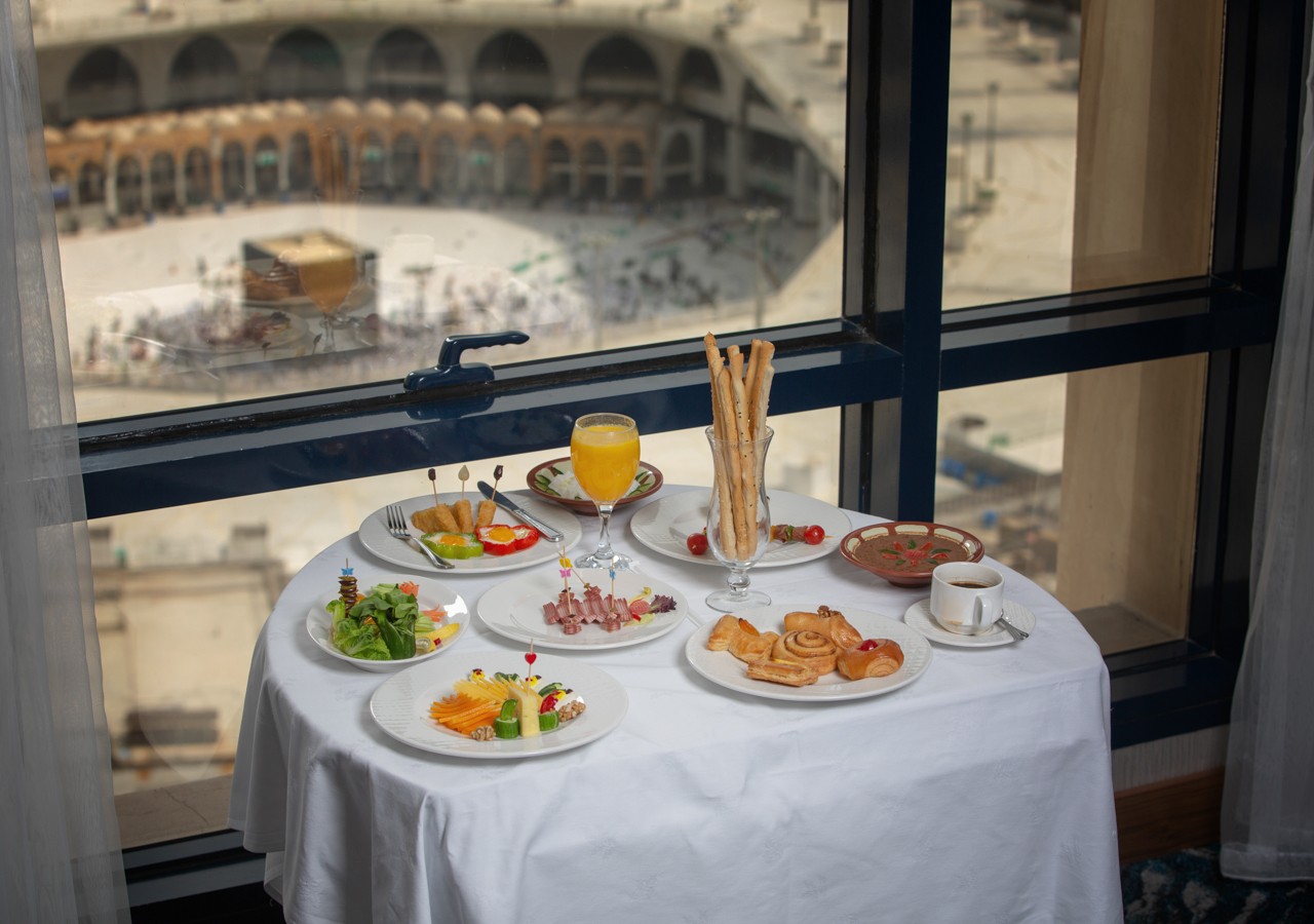 Al Safwah Royale Orchid - Luxury room interior with Haram view, premium Umrah accommodation facilities and amenities