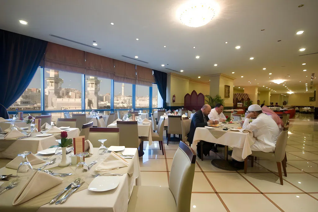 Al Safwah Royale Orchid - Luxury room interior with Haram view, premium Umrah accommodation facilities and amenities