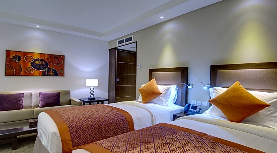 Crowne Plaza Madinah, an IHG Hotel - Deluxe hotel room interior near Masjid Nabawi, Islamic heritage accommodation amenities