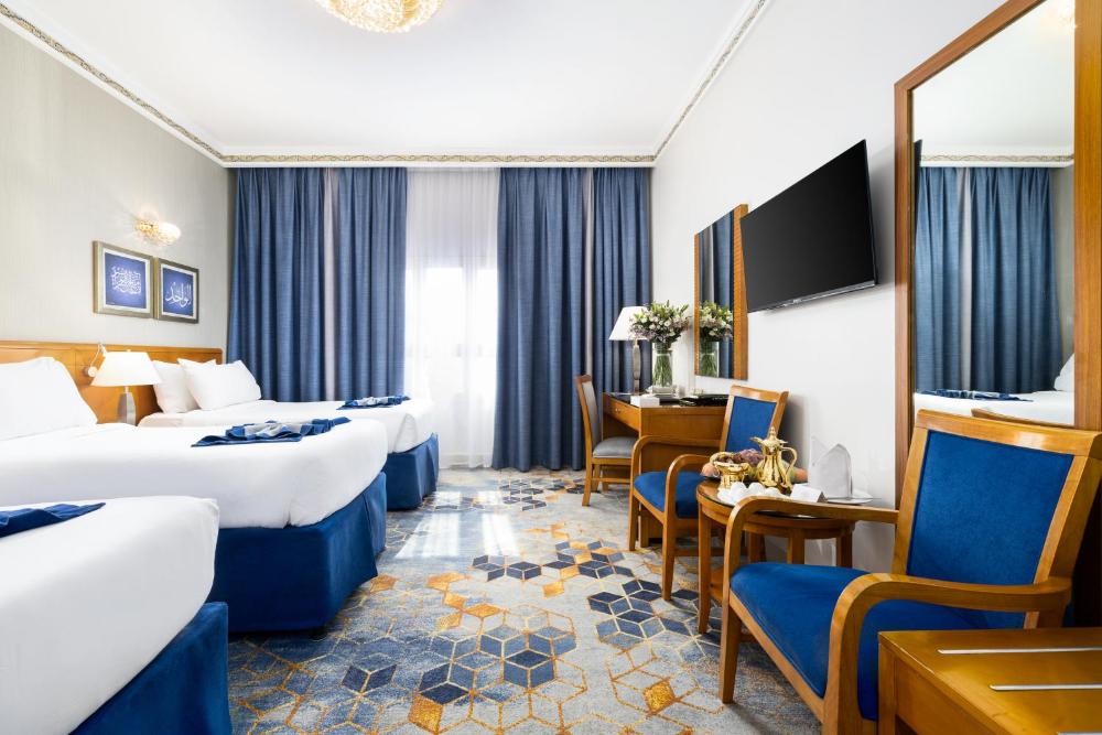 Emaar Grand Hotel Mecca - Luxury room interior with Haram view, premium Umrah accommodation facilities and amenities