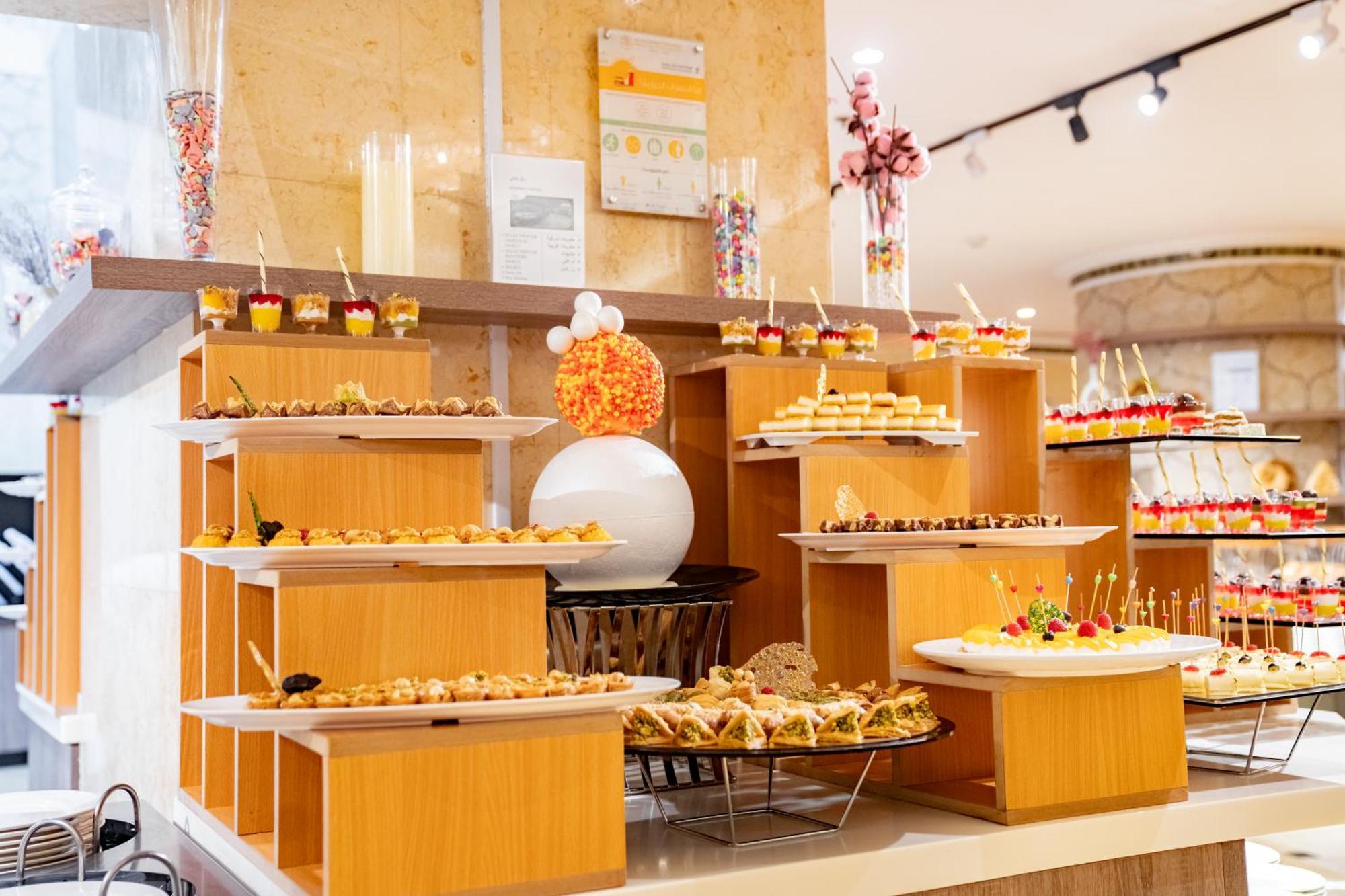 Emaar Grand Hotel Mecca - Luxury room interior with Haram view, premium Umrah accommodation facilities and amenities