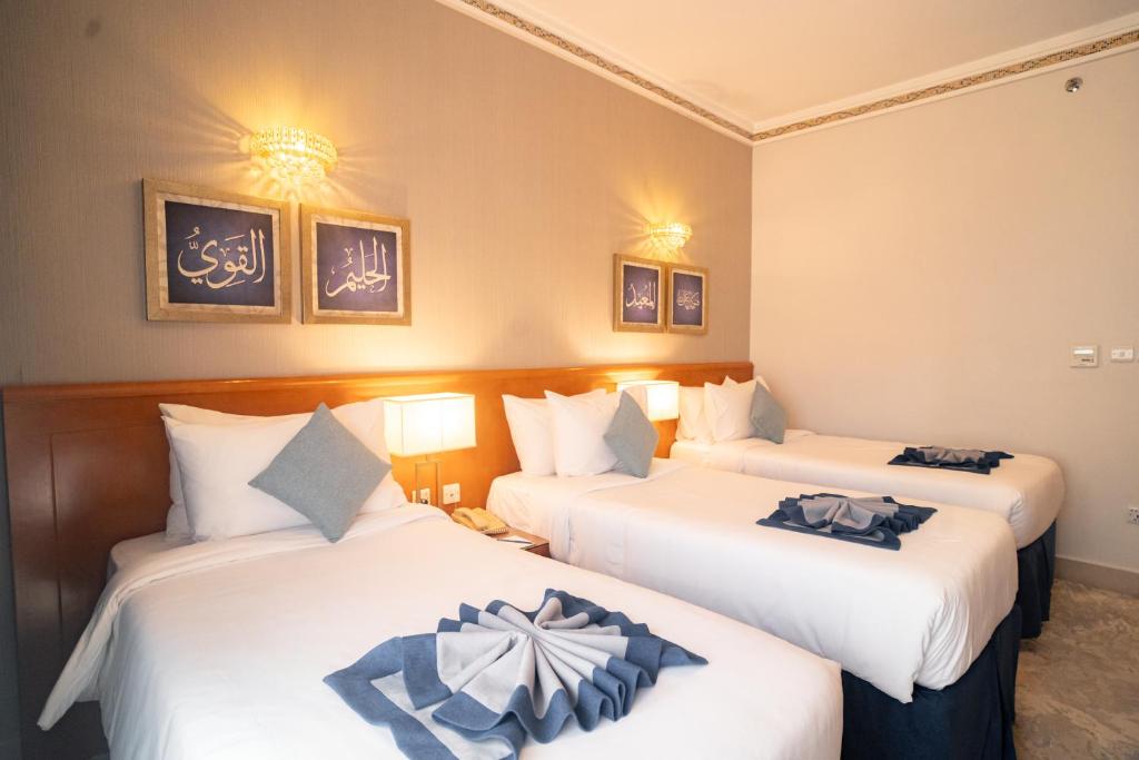 Emaar Grand Hotel Mecca - Luxury room interior with Haram view, premium Umrah accommodation facilities and amenities