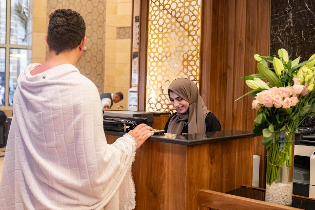 Emaar Grand Hotel Mecca - Luxury room interior with Haram view, premium Umrah accommodation facilities and amenities