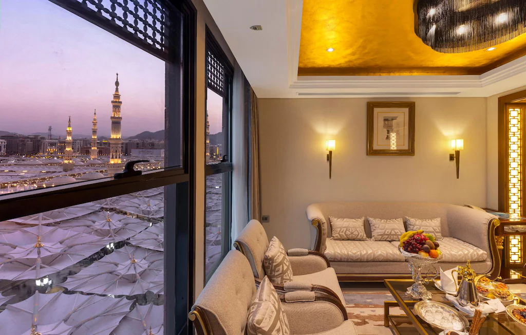 InterContinental Dar al Iman Madinah - Deluxe hotel room interior near Masjid Nabawi, Islamic heritage accommodation amenities
