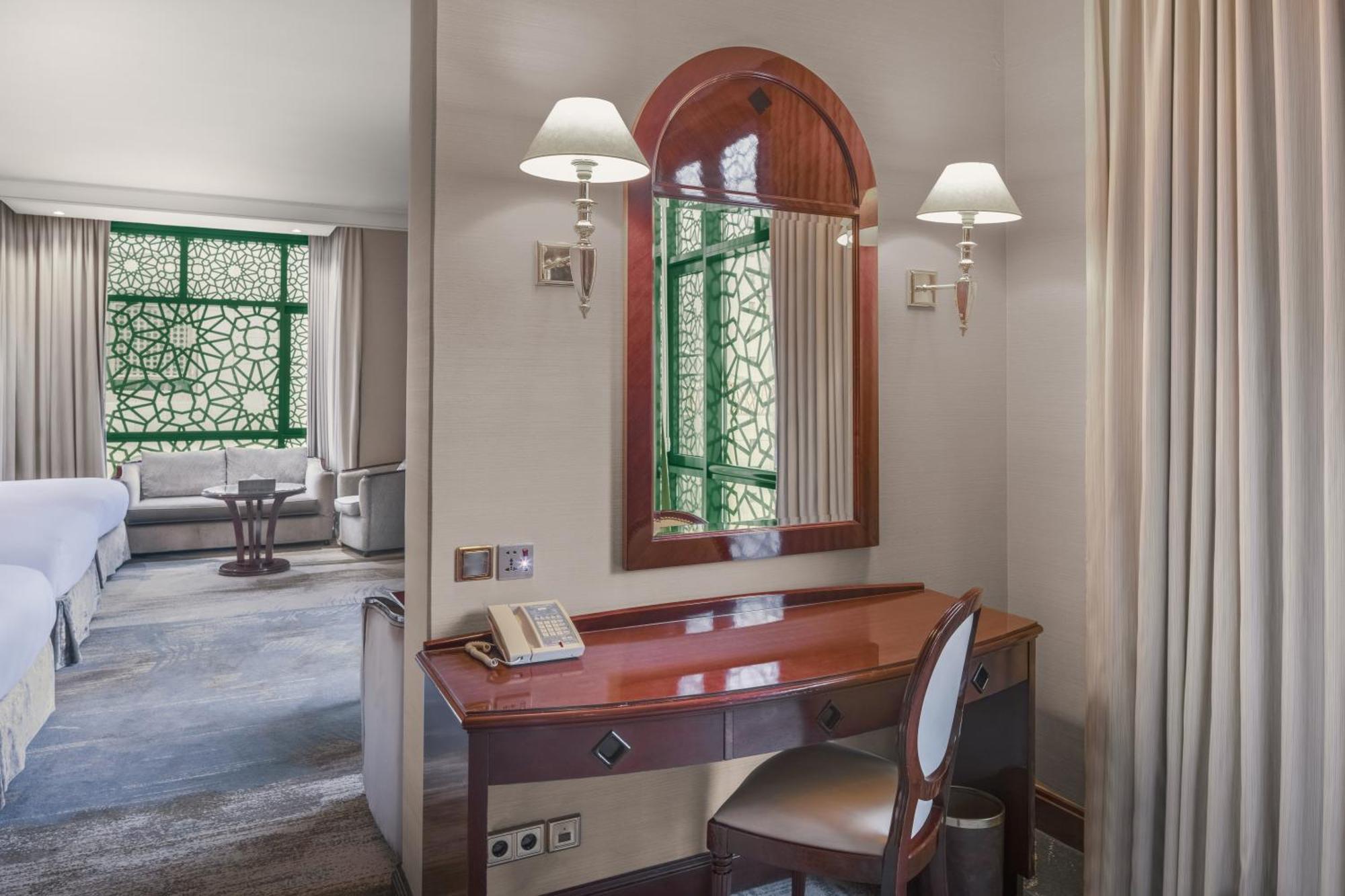 Madinah Hilton - Deluxe hotel room interior near Masjid Nabawi, Islamic heritage accommodation amenities