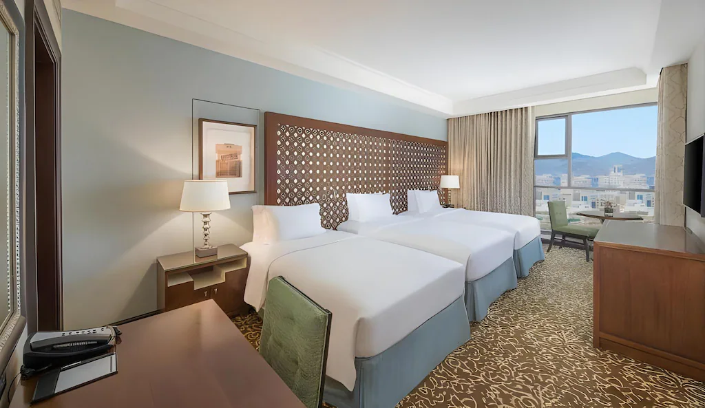 Swissotel Al Maqam Makkah - Luxury room interior with Haram view, premium Umrah accommodation facilities and amenities